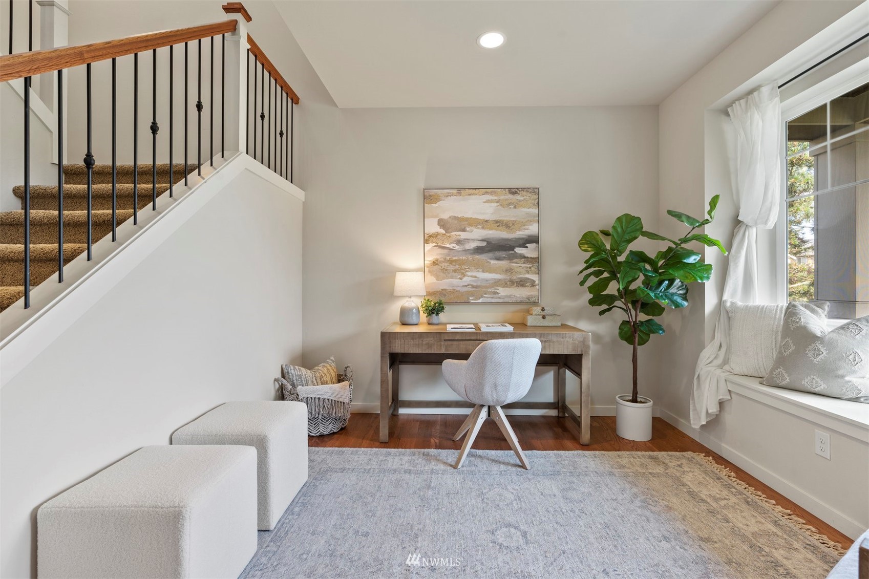 4320 230th Place Southeast Bothell, WA 98021 - Photo 6 of 31 a living room with furniture and a potted plant