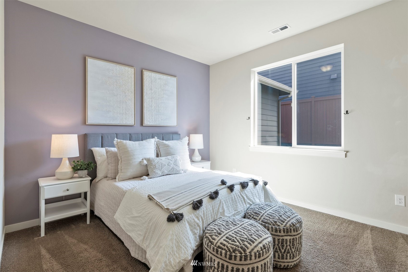 4320 230th Place Southeast Bothell, WA 98021 - Photo 9 of 31 a bed room with a bed and a chair