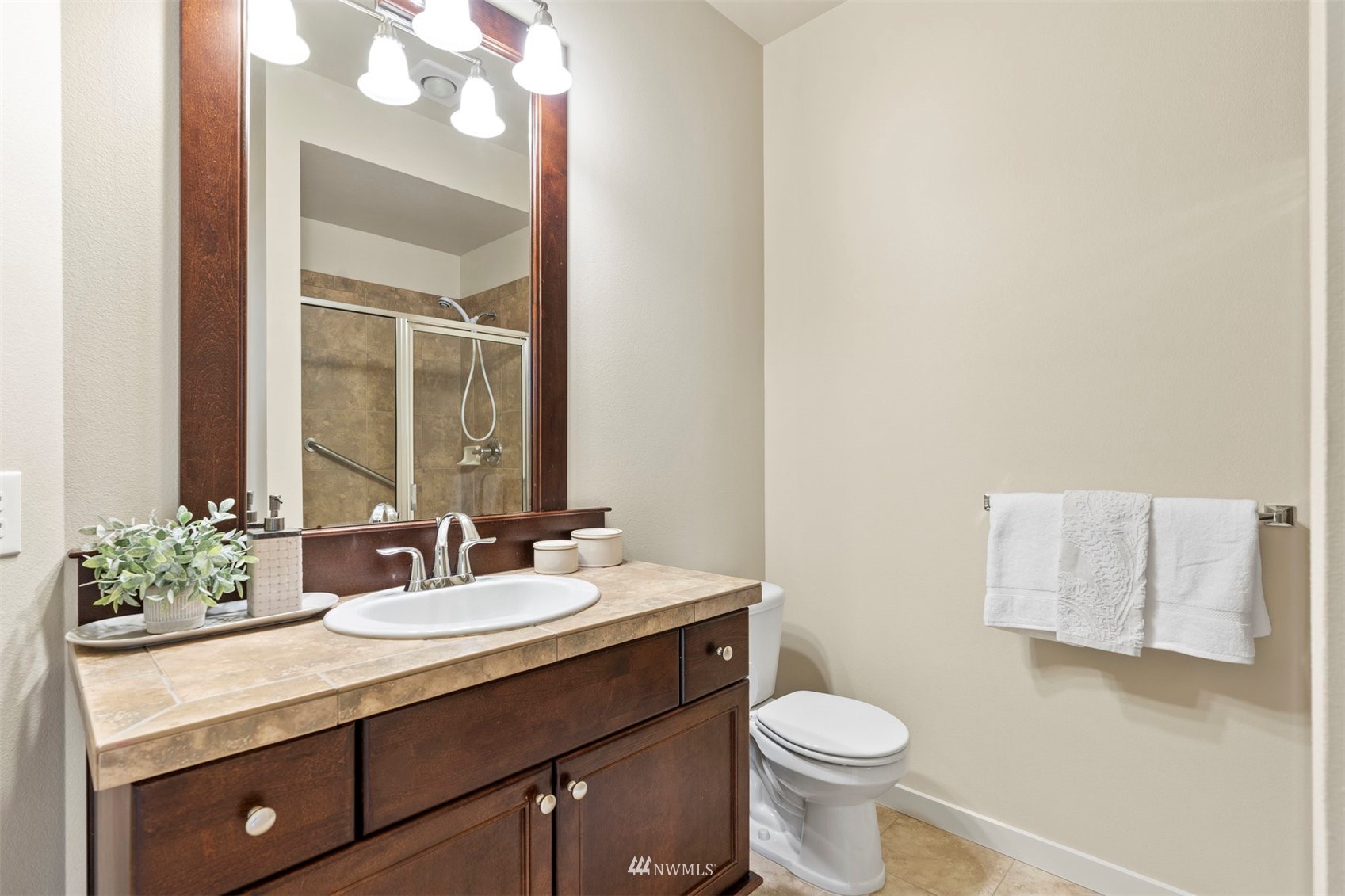 4320 230th Place Southeast Bothell, WA 98021 - Photo 10 of 31 a bathroom with a sink and a mirror