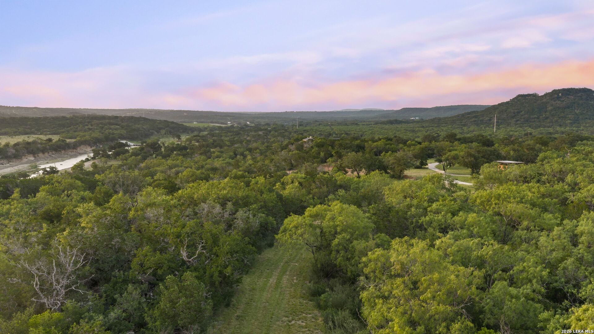 3402 Mormon Mill Road Marble Falls, TX 78654 - Photo 17 of 29 a view of a city with lush green forest