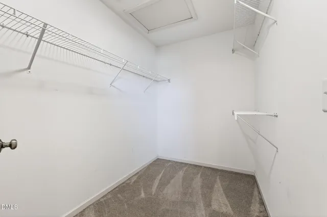 a view of small space with racks on the wall