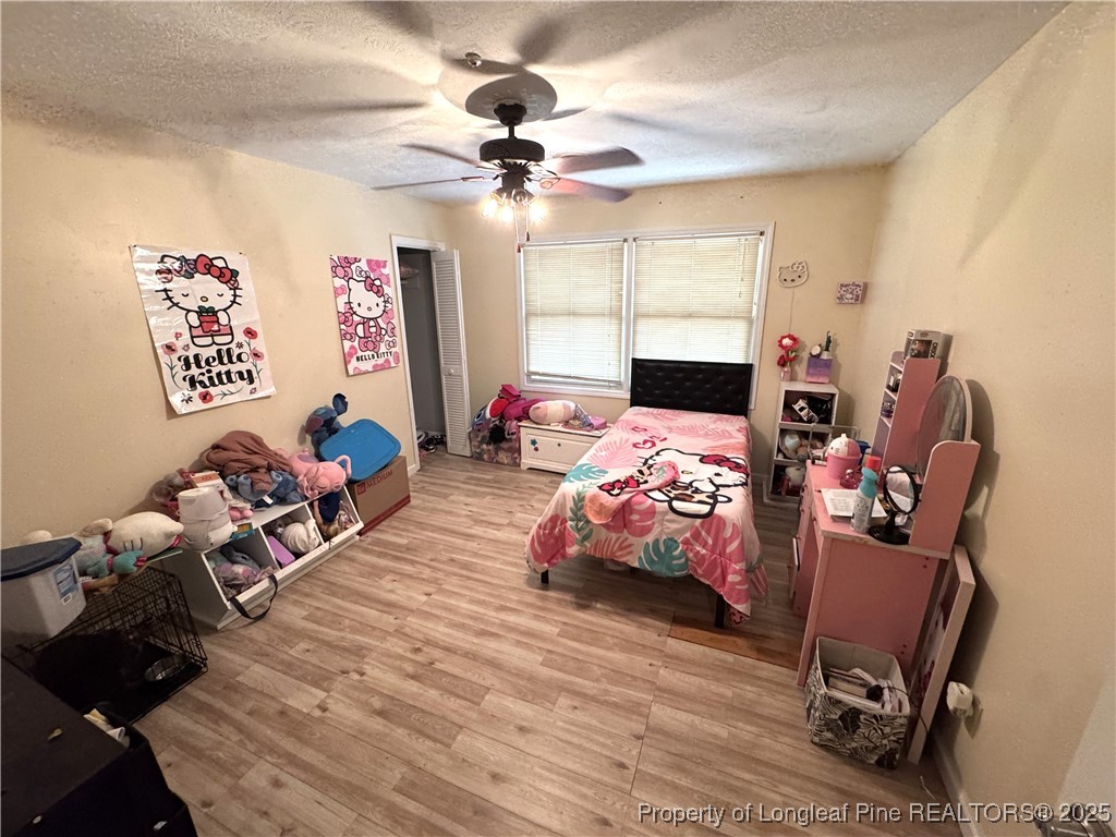 310 Old Hertford Ln Spring Lake Spring Lake, NC 28390 - Photo 21 of 30 a bedroom with furniture and a window
