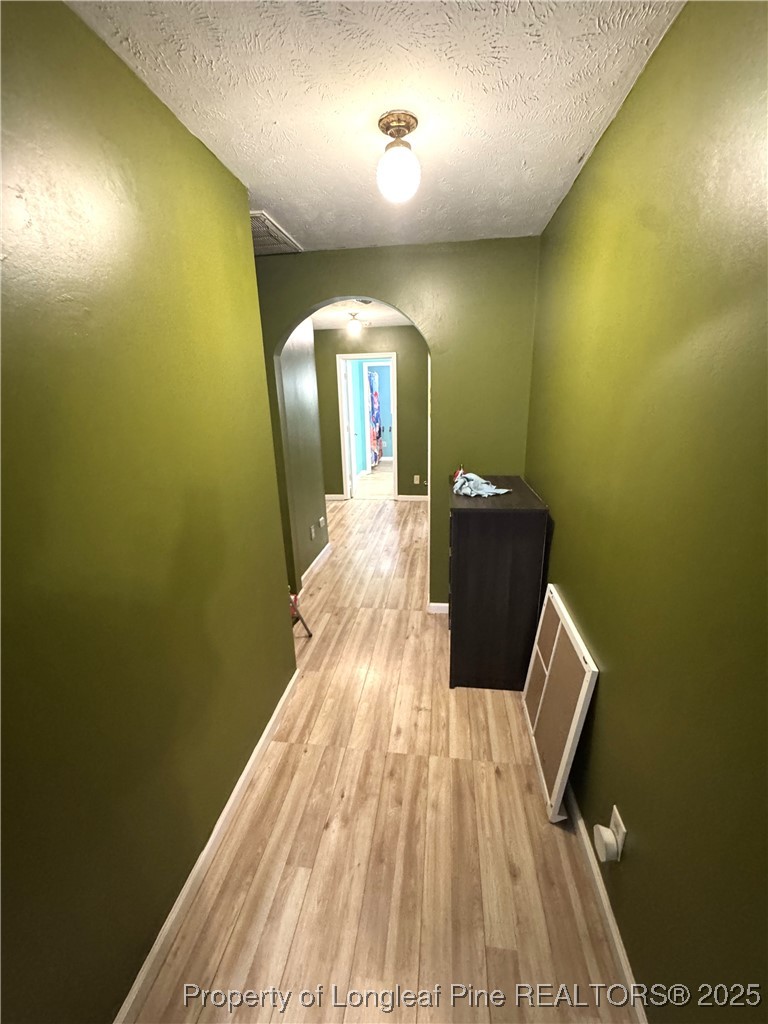 310 Old Hertford Ln Spring Lake Spring Lake, NC 28390 - Photo 24 of 28 a hallway with a wooden floor
