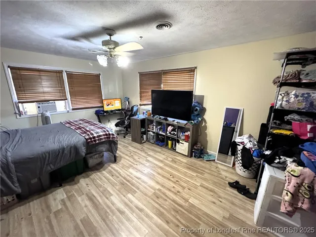 a hallway with a wooden floor