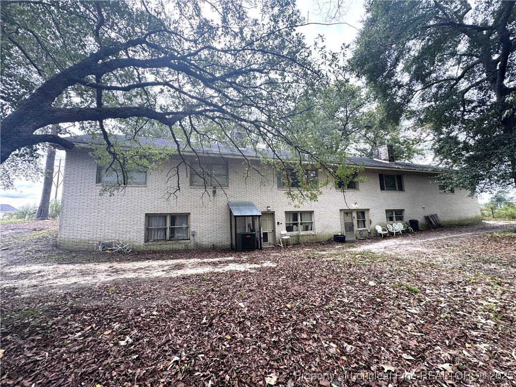 310 Old Hertford Ln Spring Lake Spring Lake, NC 28390 - Photo 30 of 30 a view of a house with a yard
