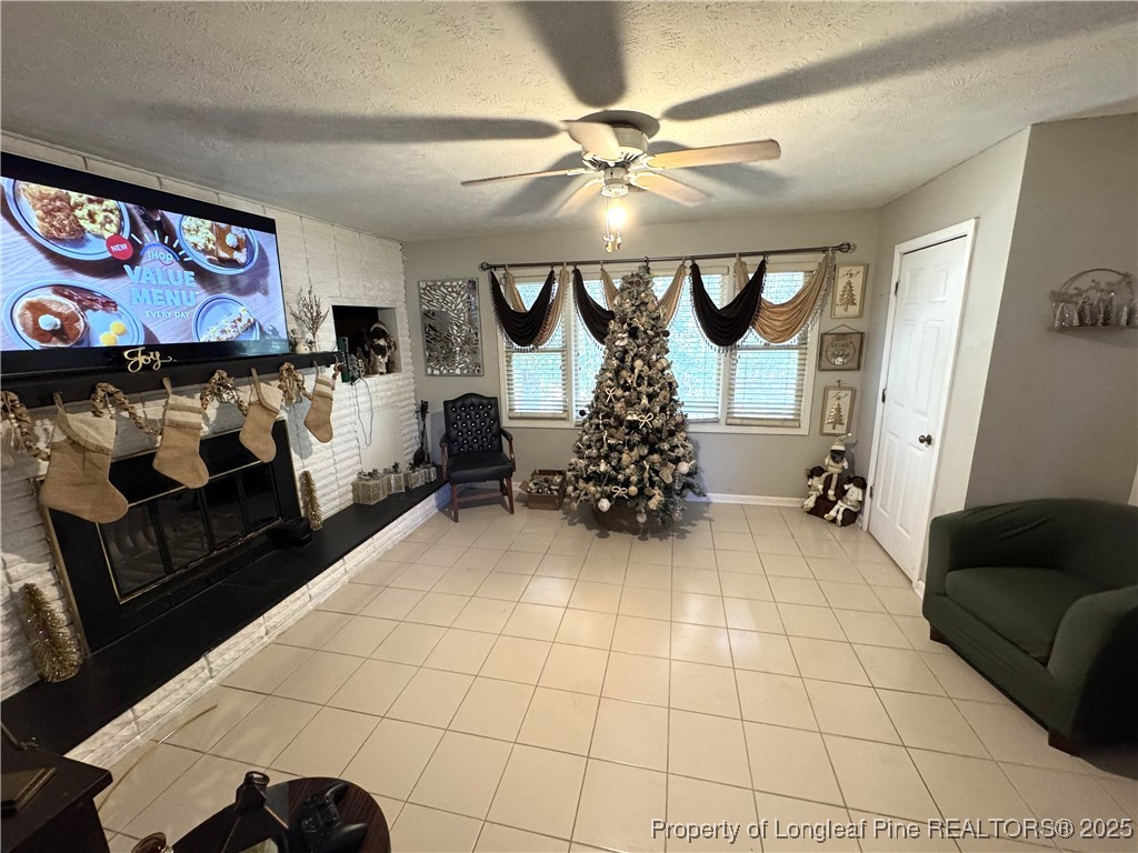 310 Old Hertford Ln Spring Lake Spring Lake, NC 28390 - Photo 5 of 30 a living room with furniture and a flat screen tv