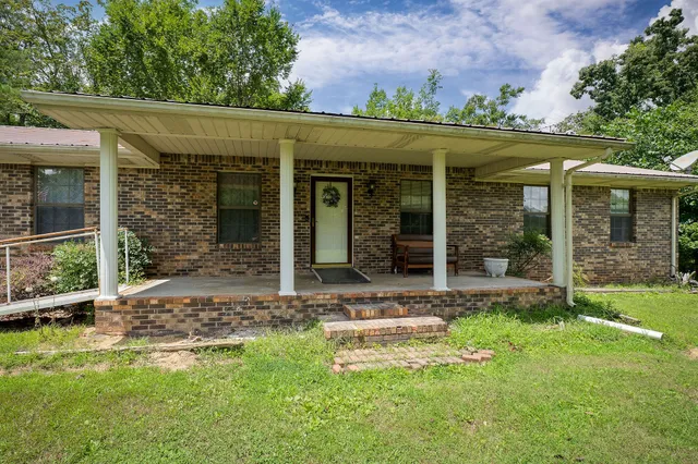 front view of a house with a yard