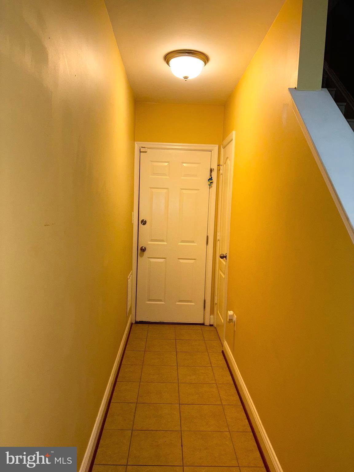 4218 Potomac Highlands Circle Triangle, VA 22172 - Photo 17 of 18 Lower Level Access to Garage and Bedroom