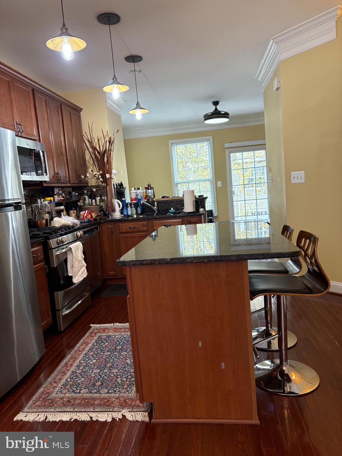 4218 Potomac Highlands Circle Triangle, VA 22172 - Photo 3 of 18 Upper Level 1 - Kitchen Island w-Bar Stools