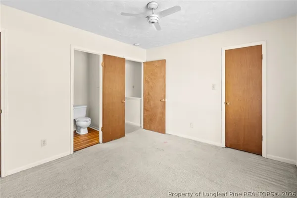 a view of a bedroom with closet area