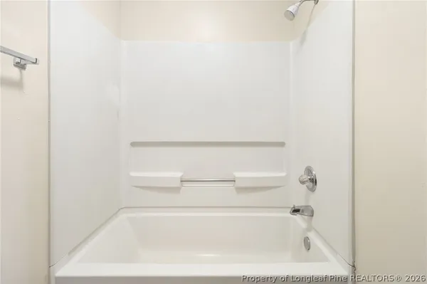 a close up of a bathtub