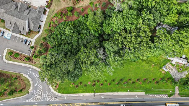 a view of a garden with a bench