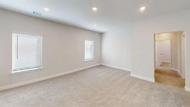 a bathroom with a shower and a sink