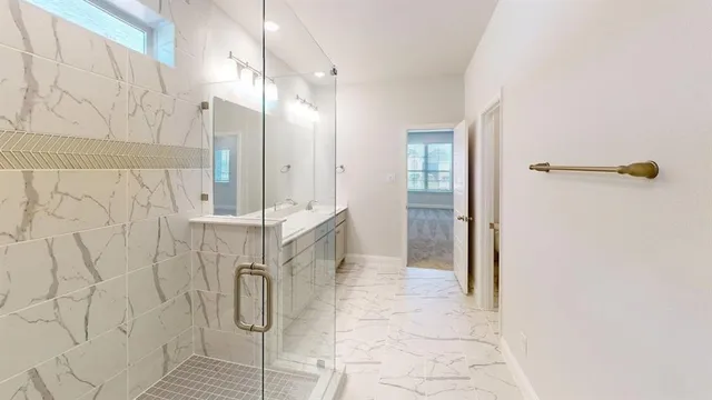 a bathroom with a toilet and bathtub