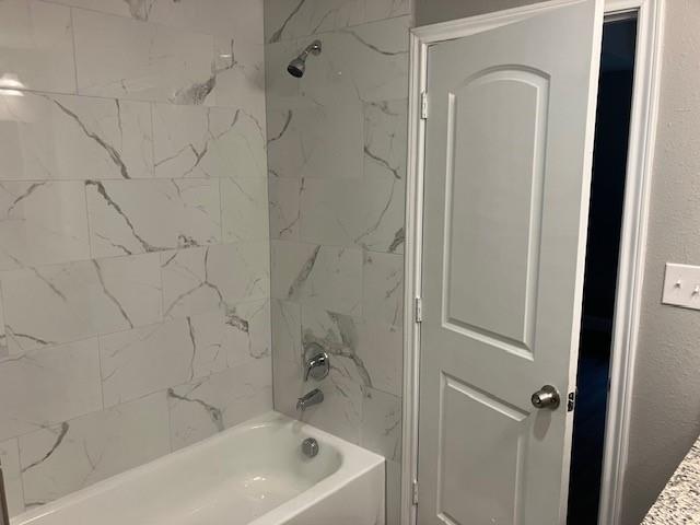 191 Geronimo Mabank, TX 75156 - Photo 12 of 12 a bathroom with a bathtub