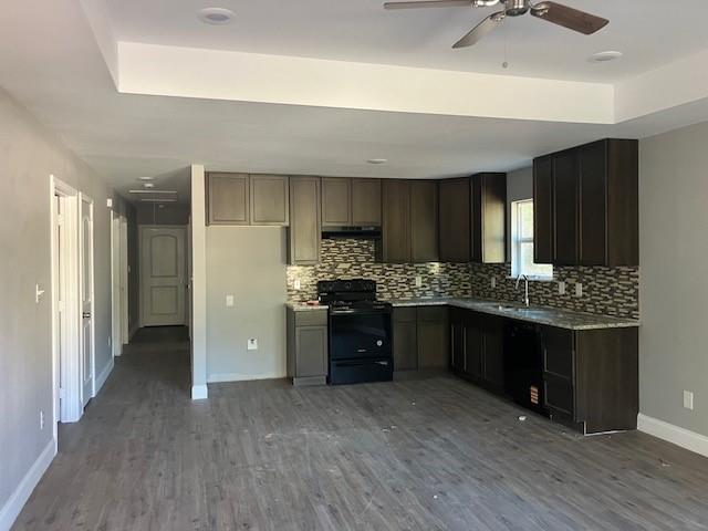 191 Geronimo Mabank, TX 75156 - Photo 3 of 12 a kitchen with a refrigerator and a sink