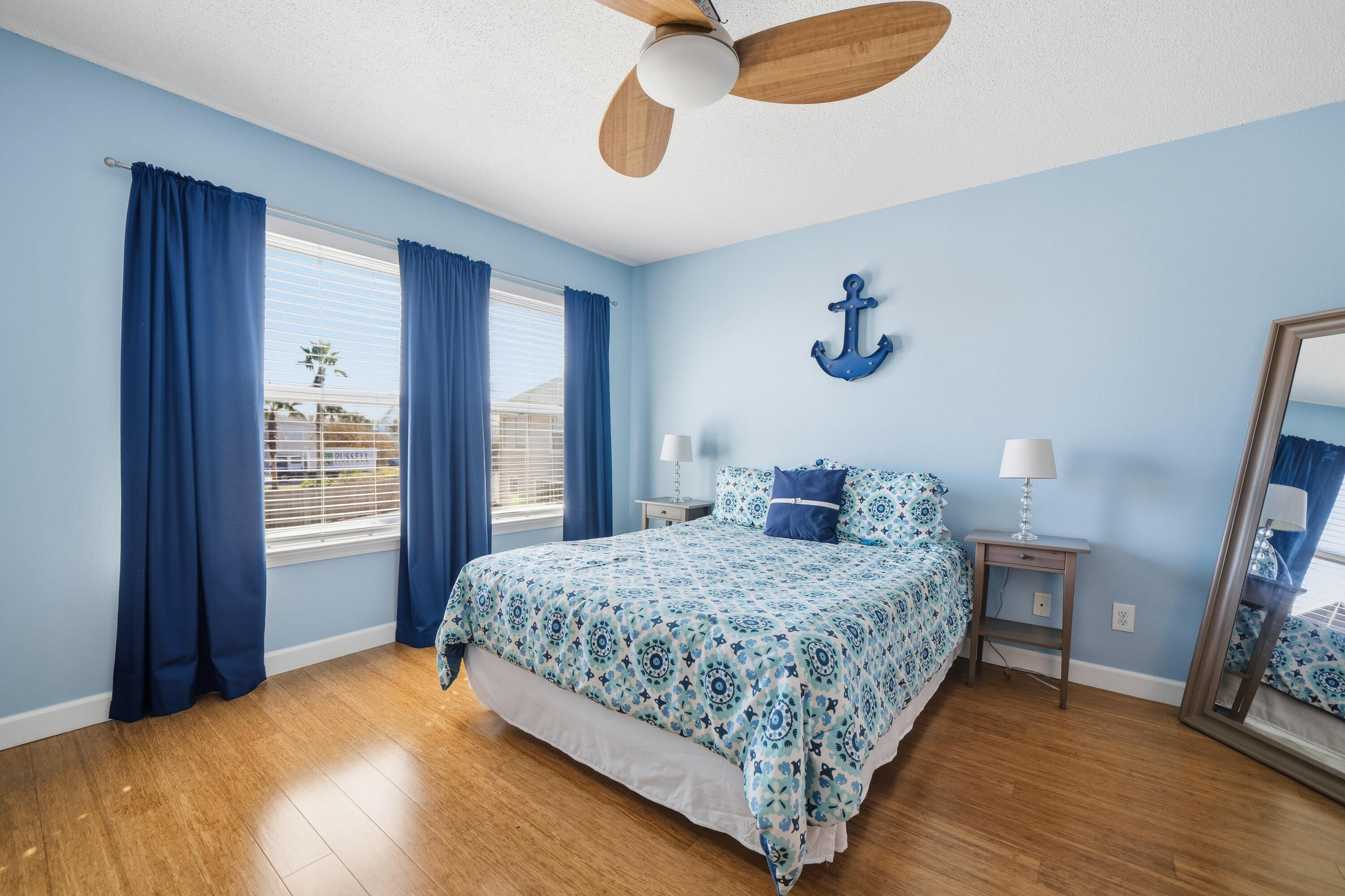 130 Durango Road, Unit 107 Destin, FL 32541 - Photo 22 of 44 a bedroom with a bed and window