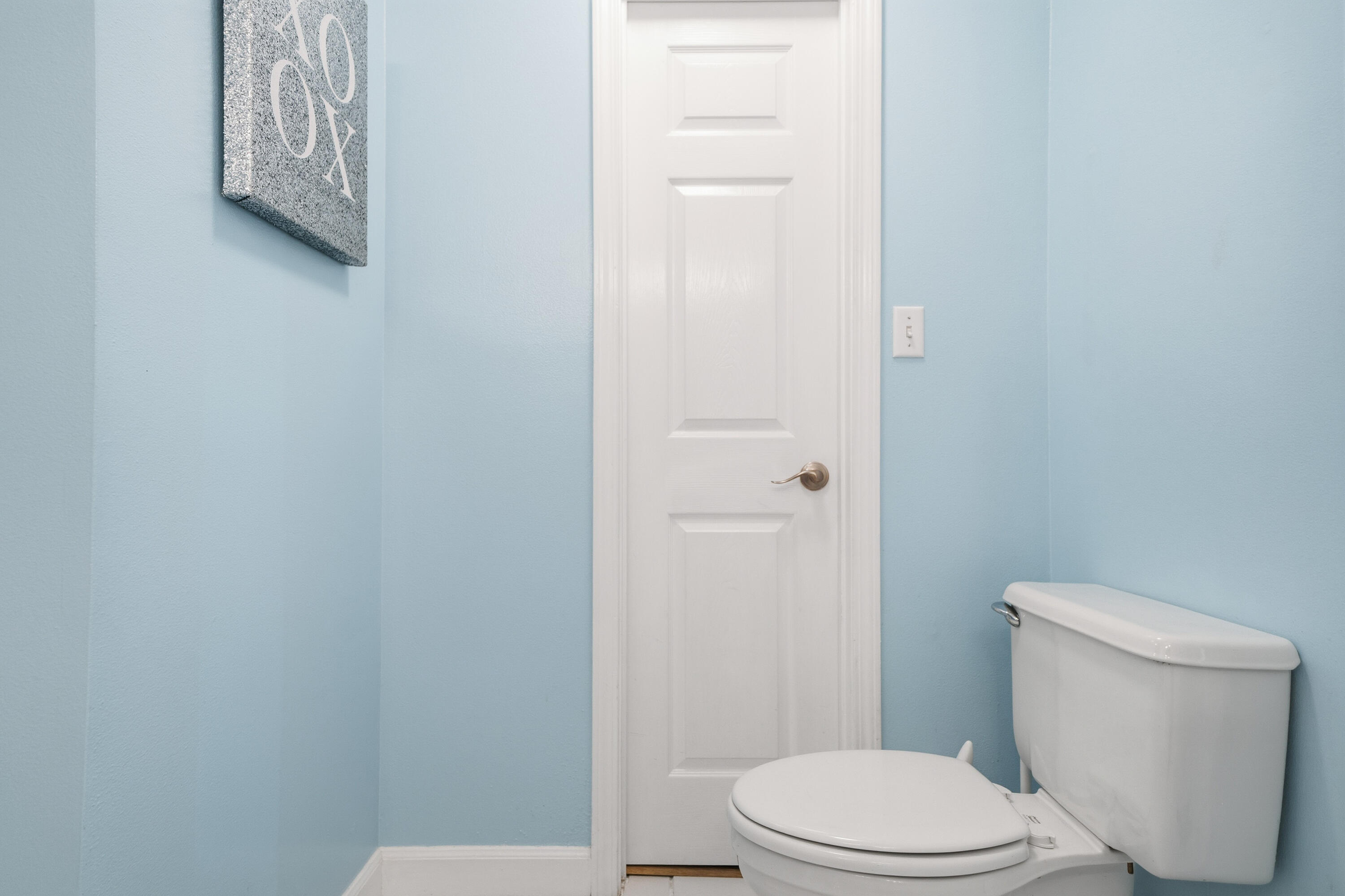 130 Durango Road, Unit 107 Destin, FL 32541 - Photo 26 of 44 a white toilet sitting next to a shower
