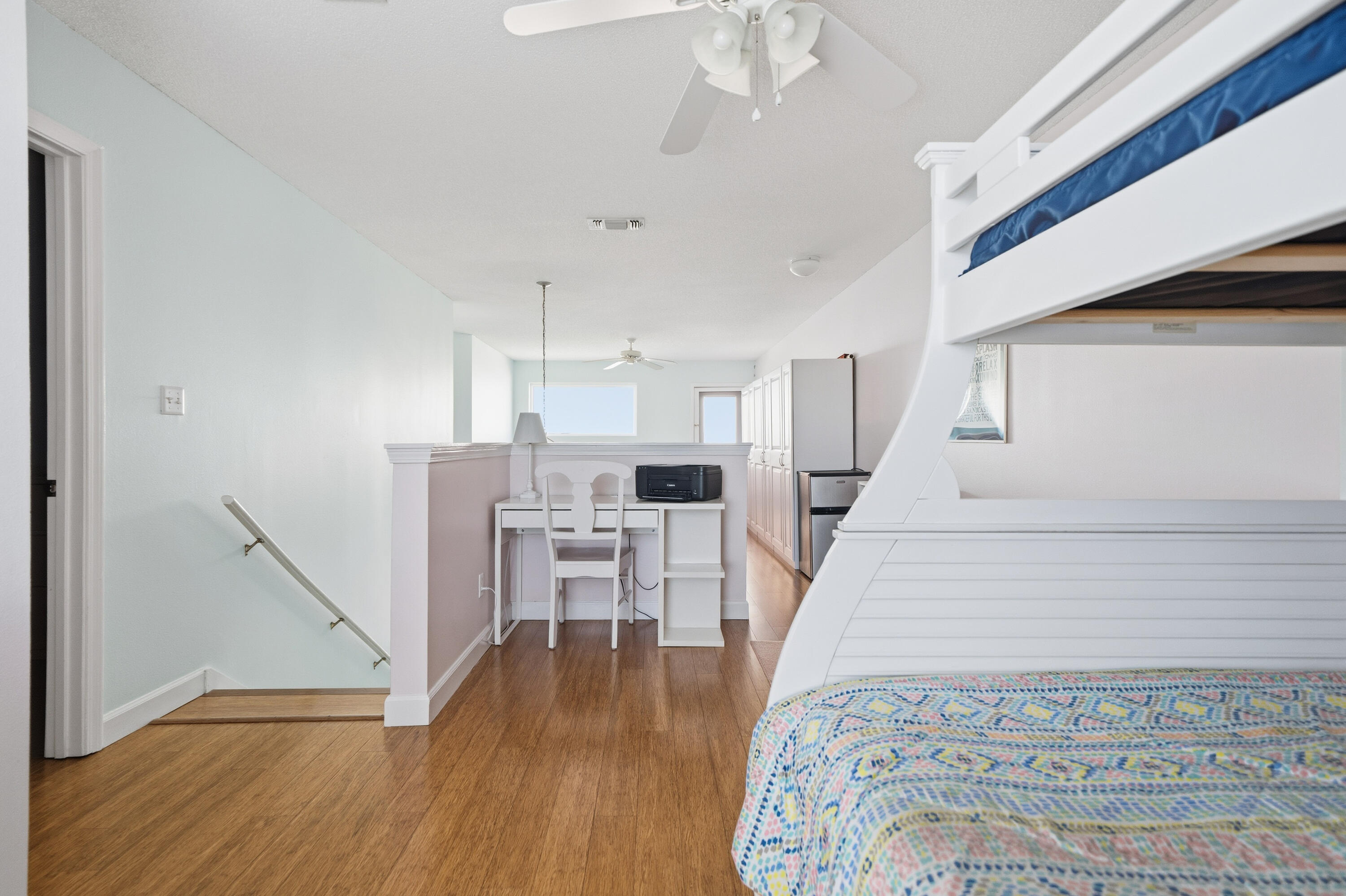 130 Durango Road, Unit 107 Destin, FL 32541 - Photo 29 of 44 a living room with stainless steel appliances furniture and a wooden floor
