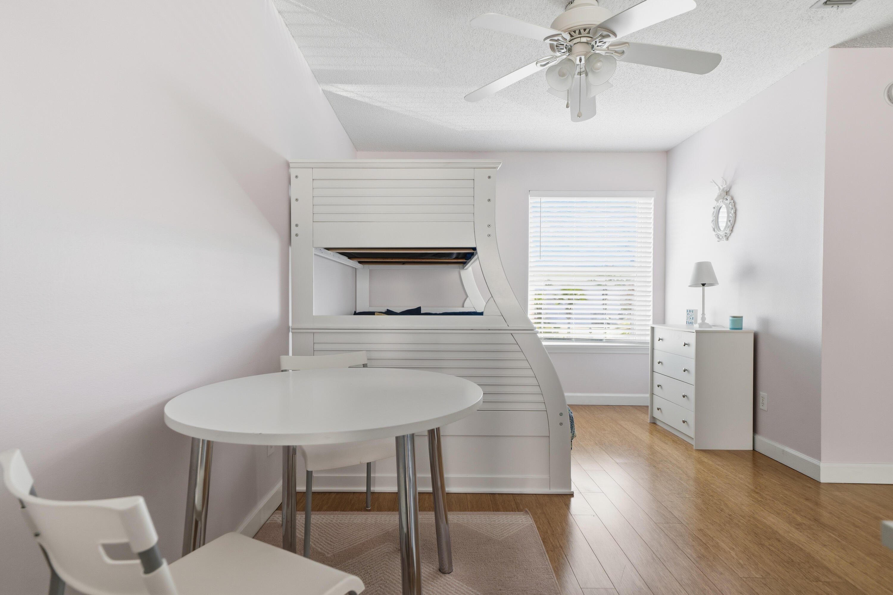 130 Durango Road, Unit 107 Destin, FL 32541 - Photo 30 of 44 a living room with furniture and a table