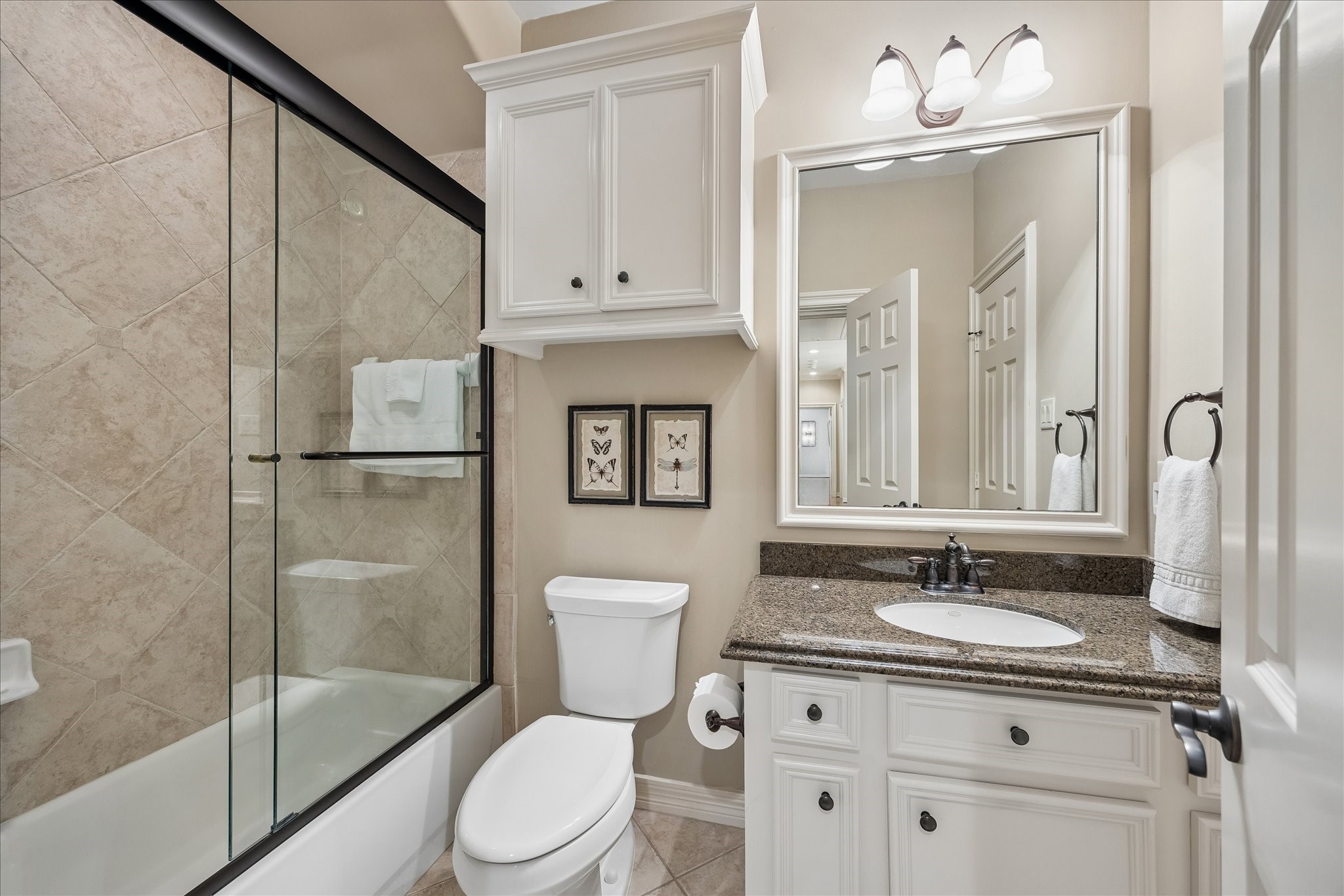 802 Anderson Street Bellaire, TX 77401 - Photo 27 of 36 This bath services the upstairs game room and the 4th upstairs bedroom.