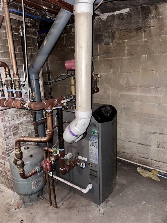 128 Mill Street Springfield, MA 01108 - Photo 11 of 14 a room with gym equipment