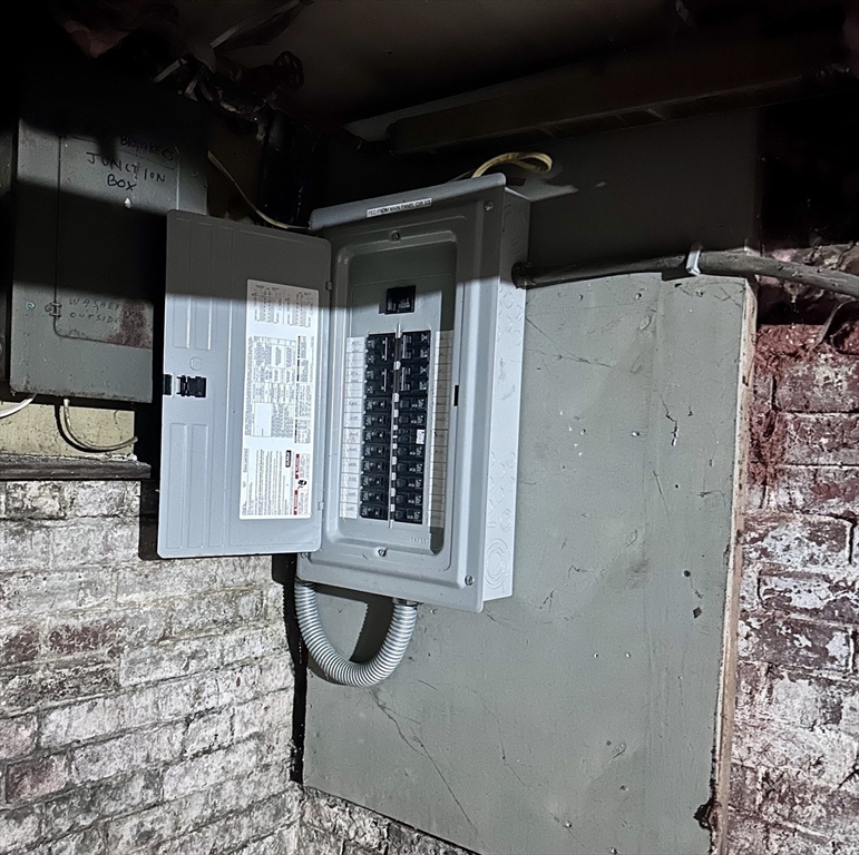 128 Mill Street Springfield, MA 01108 - Photo 12 of 14 a front view of a house with entryway