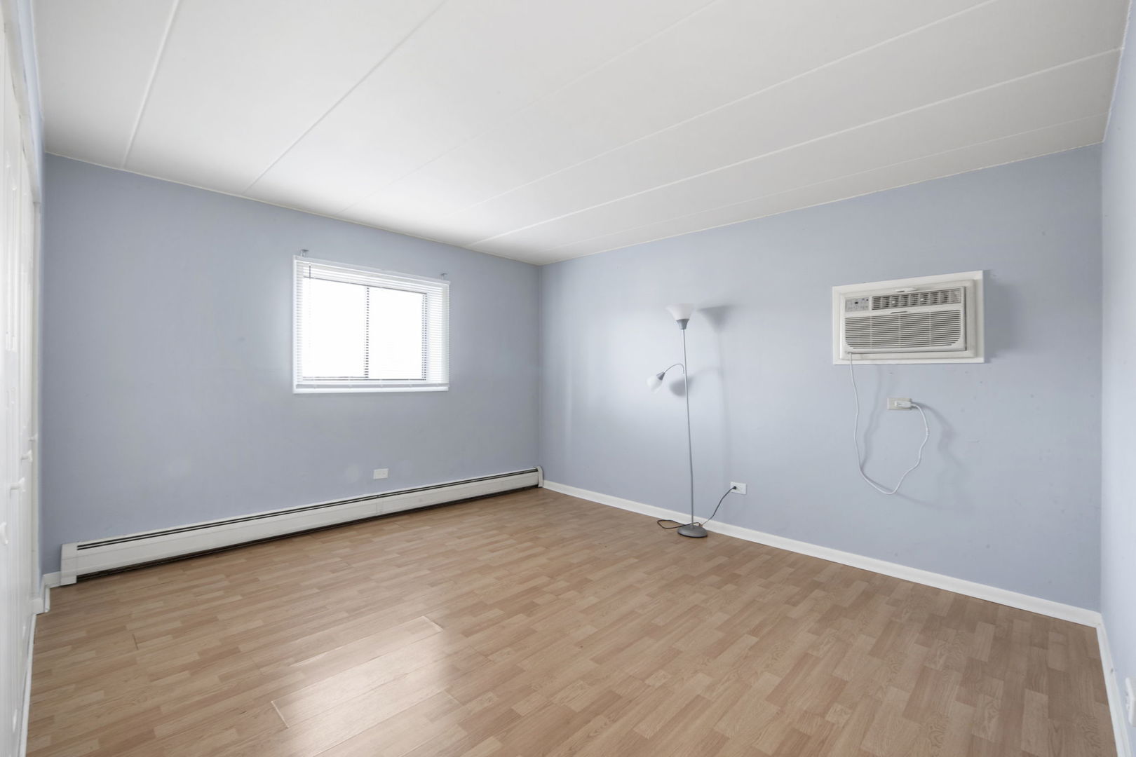 104 East Bailey Road, Unit A Naperville, IL 60565 - Photo 12 of 16 an empty room with windows