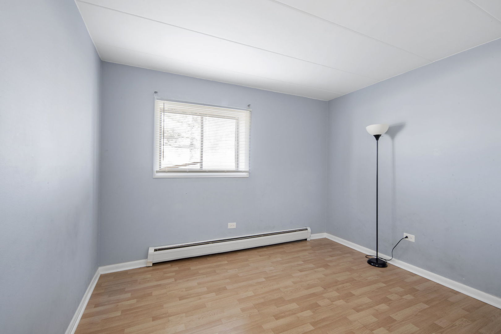 104 East Bailey Road, Unit A Naperville, IL 60565 - Photo 14 of 16 an empty room with a empty space and a window