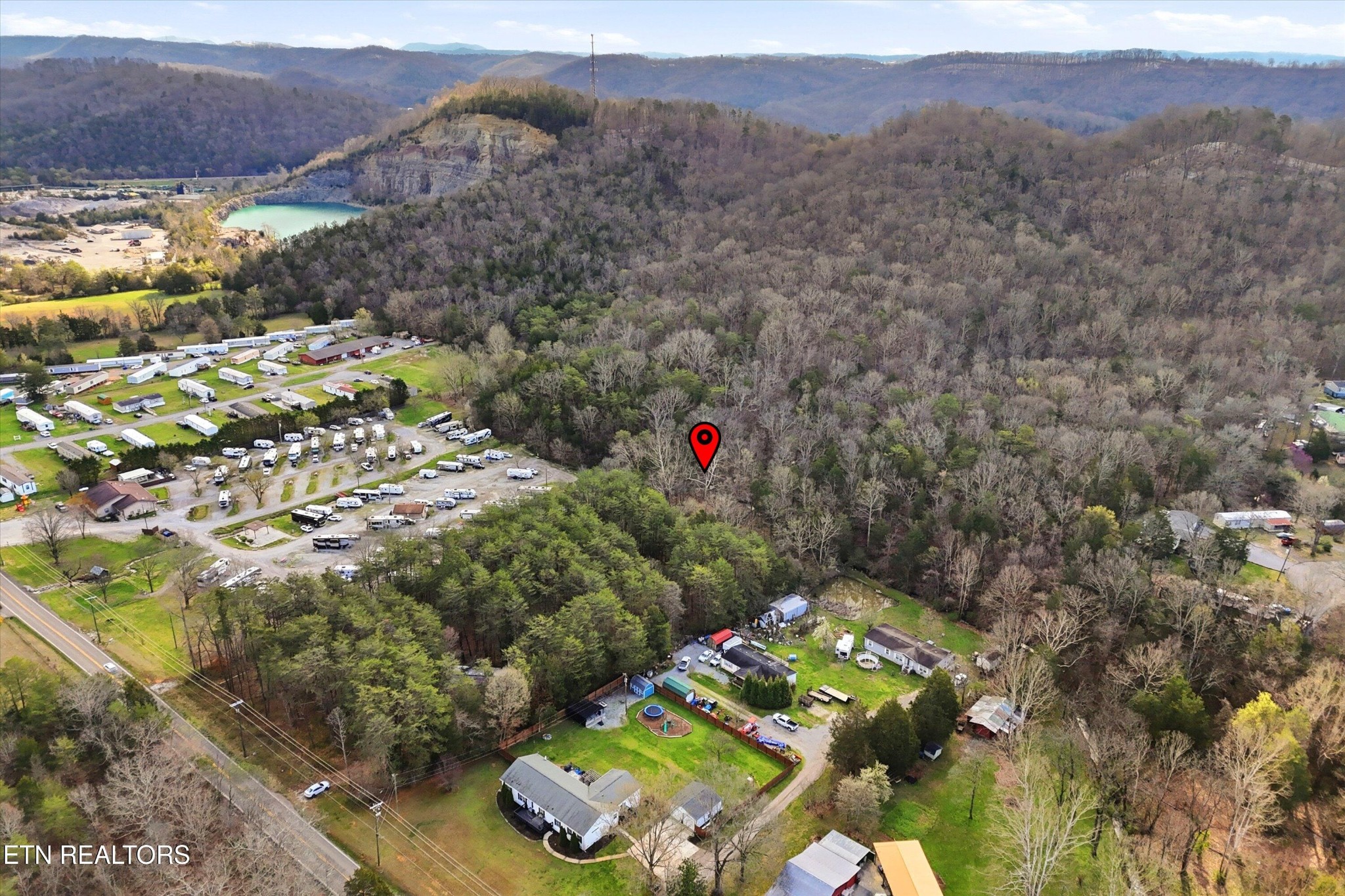 842 East Raccoon Valley Drive Heiskell, TN 37754 - Photo 2 of 17 a aerial view of a house with a yard