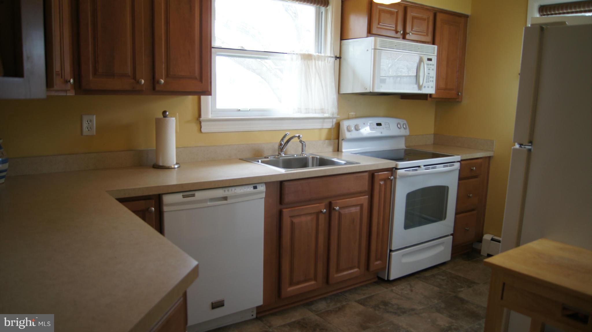 7314 Knollwood Road Baltimore, MD 21286 - Photo 12 of 30 Renovated kitchen with ceramic flooring