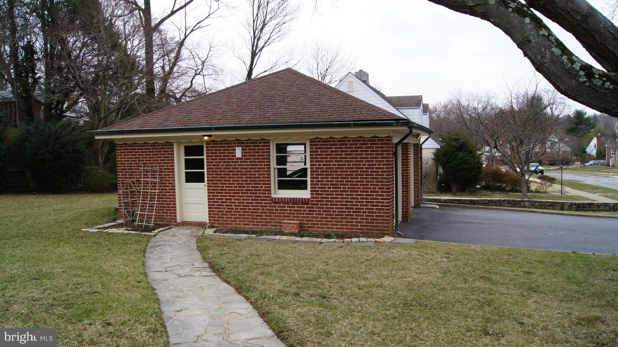 7314 Knollwood Road Baltimore, MD 21286 - Photo 26 of 30 two-car garage with driveway.