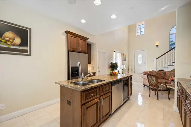 a kitchen that has a sink and cabinets