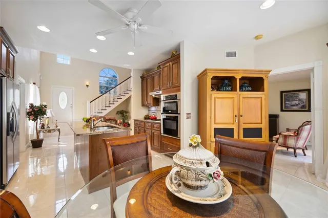 a bedroom with a bed and a lamp