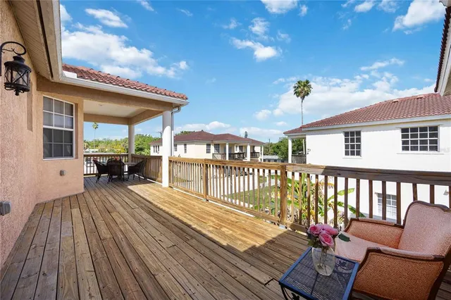 a view of a balcony dining area