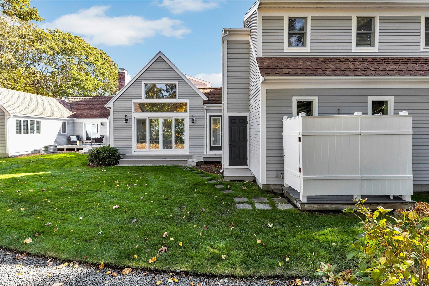 14 Ryder Road North Falmouth, MA 02556 - Photo 22 of 85 a front view of a house with a garden