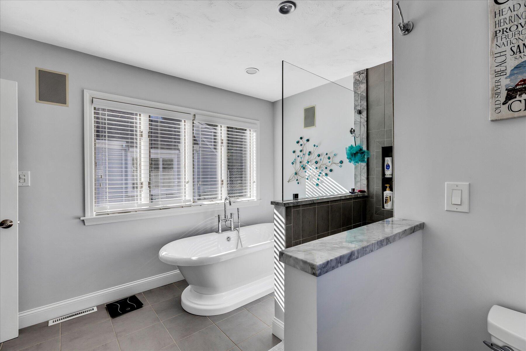 14 Ryder Road North Falmouth, MA 02556 - Photo 47 of 85 a bathroom with a sink and mirror with toilet