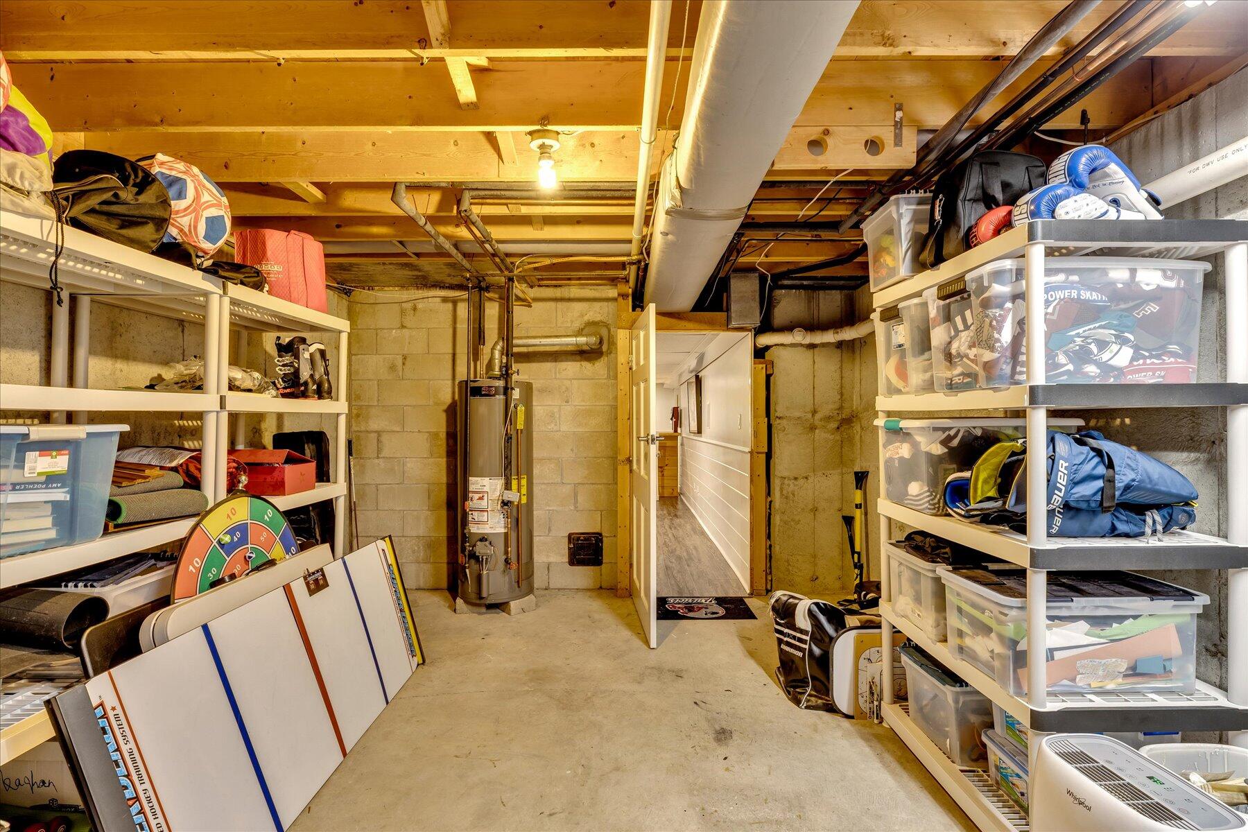 14 Ryder Road North Falmouth, MA 02556 - Photo 67 of 85 a view of walk in closet with clothes and shoes