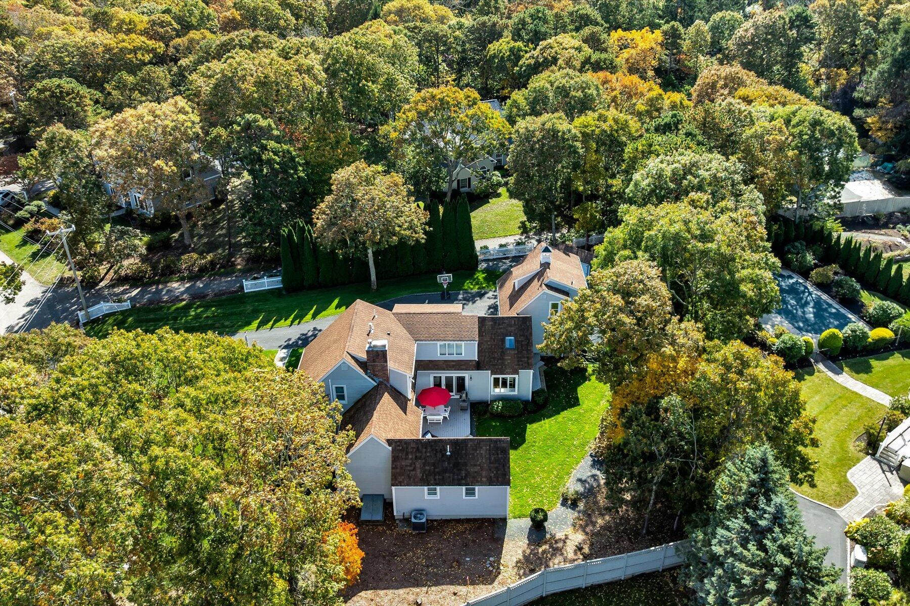14 Ryder Road North Falmouth, MA 02556 - Photo 76 of 85 an aerial view of a house with a yard basket ball court and outdoor seating