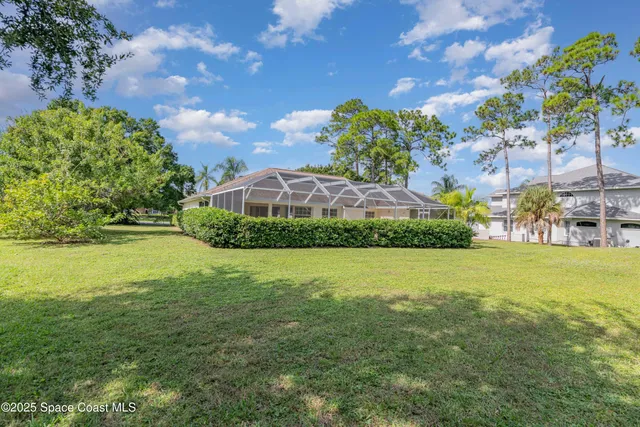 a house view with a garden space