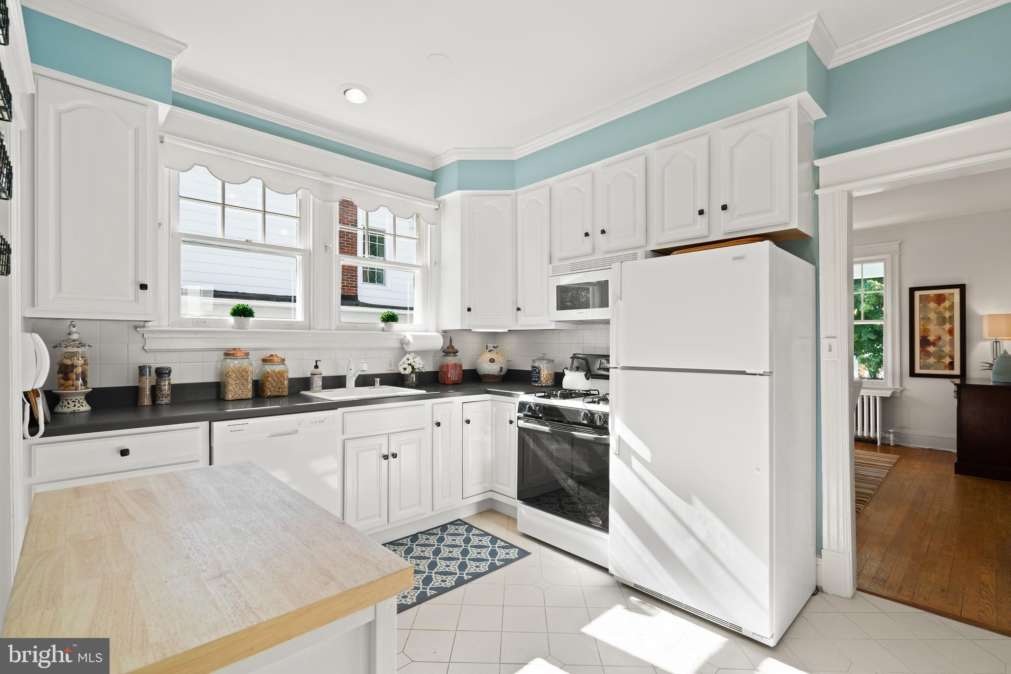 2008 Glen Ross Road Silver Spring, MD 20910 - Photo 15 of 47 SUN AND CHARM ABOUNDS IN FRESHLY PAINTED KITCHEN