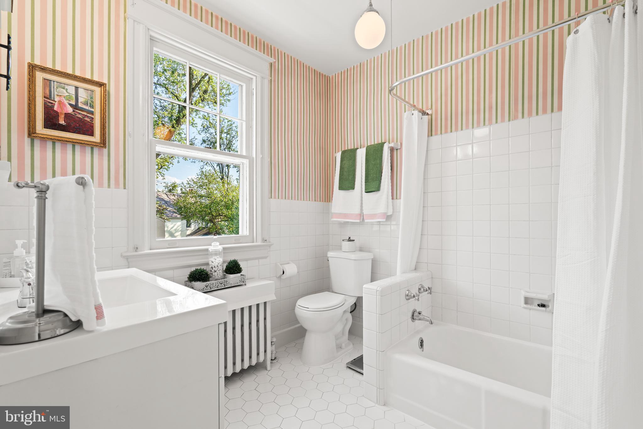 2008 Glen Ross Road Silver Spring, MD 20910 - Photo 27 of 47 CHARMING HALL BATH WITH WHITE TILE AND LOTS OF SUN
