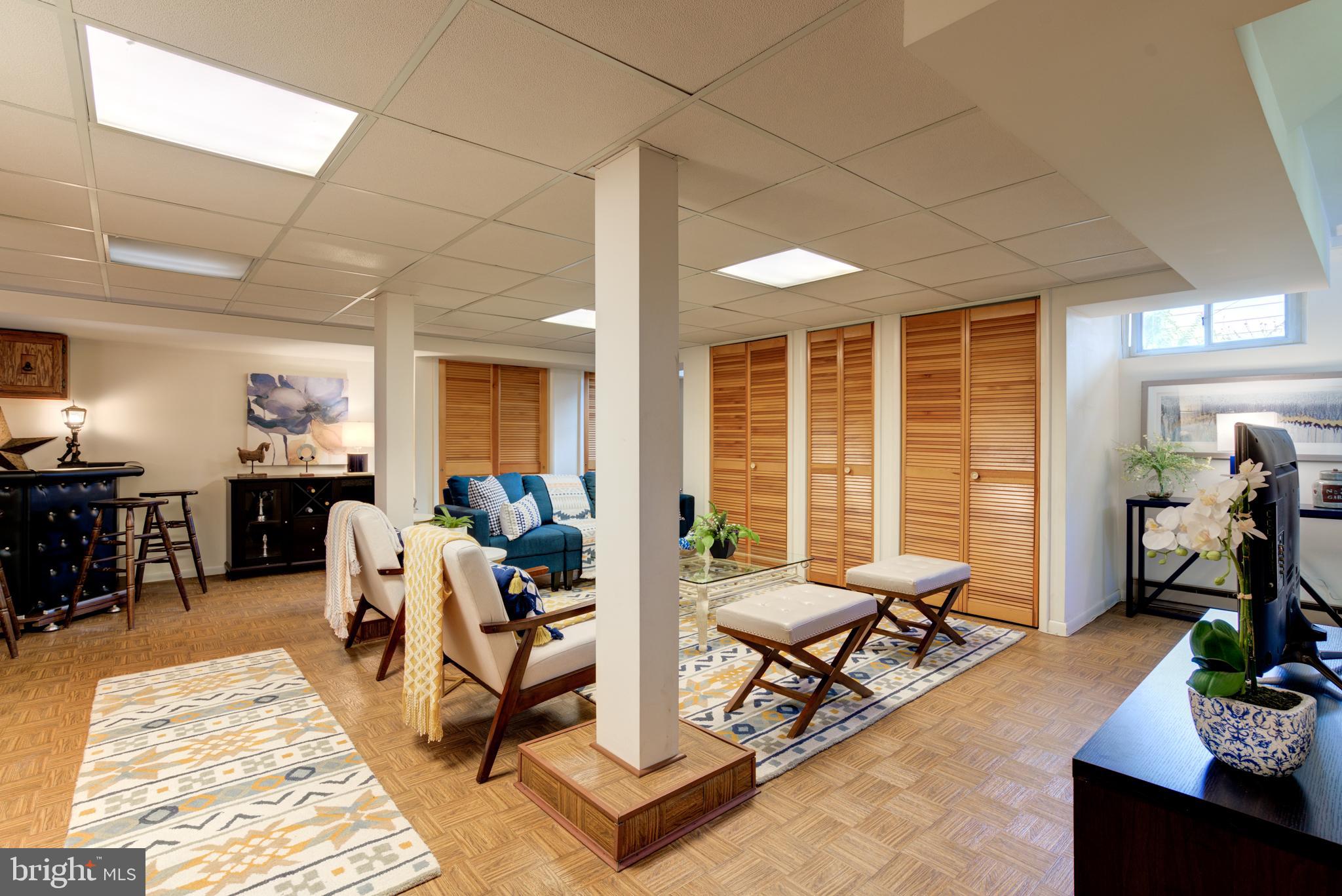 2008 Glen Ross Road Silver Spring, MD 20910 - Photo 31 of 47 SPACIOUS FINISHED REC ROOM WITH VINYL FLOOR