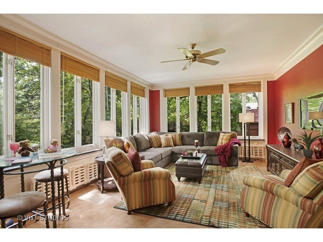 111 Broadway Avenue Wilmette, IL 60091 - Photo 13 of 25 a living room with furniture and large windows
