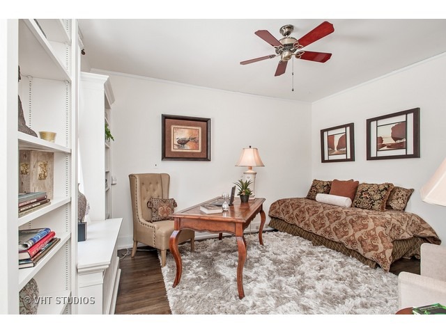 111 Broadway Avenue Wilmette, IL 60091 - Photo 14 of 25 a living room with furniture and a dining table
