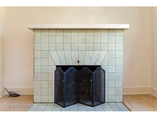 111 Broadway Avenue Wilmette, IL 60091 - Photo 20 of 25 a bathroom with a shower and a mirror