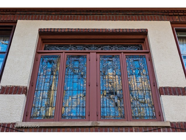 111 Broadway Avenue Wilmette, IL 60091 - Photo 22 of 25 a black and white photo of a living room