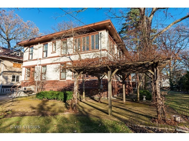 111 Broadway Avenue Wilmette, IL 60091 - Photo 24 of 25 a view of a house with a yard