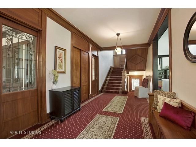 111 Broadway Avenue Wilmette, IL 60091 - Photo 4 of 25 a view of entryway and hall with wooden floor