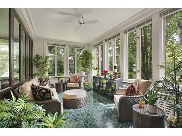 111 Broadway Avenue Wilmette, IL 60091 - Photo 7 of 25 a living room with furniture and floor to ceiling windows